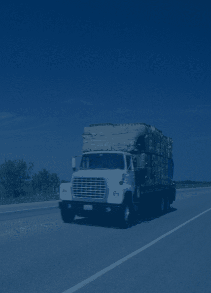 Commercial truck driving on country road