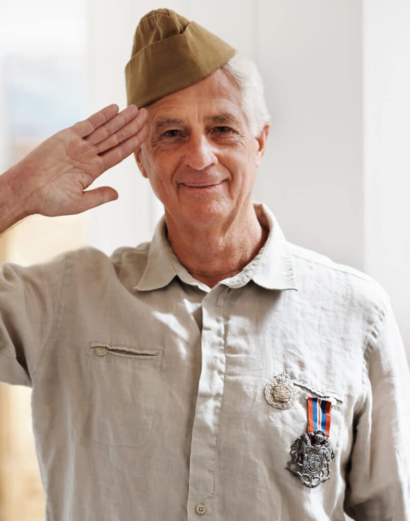 proud veteran in uniform saluting
